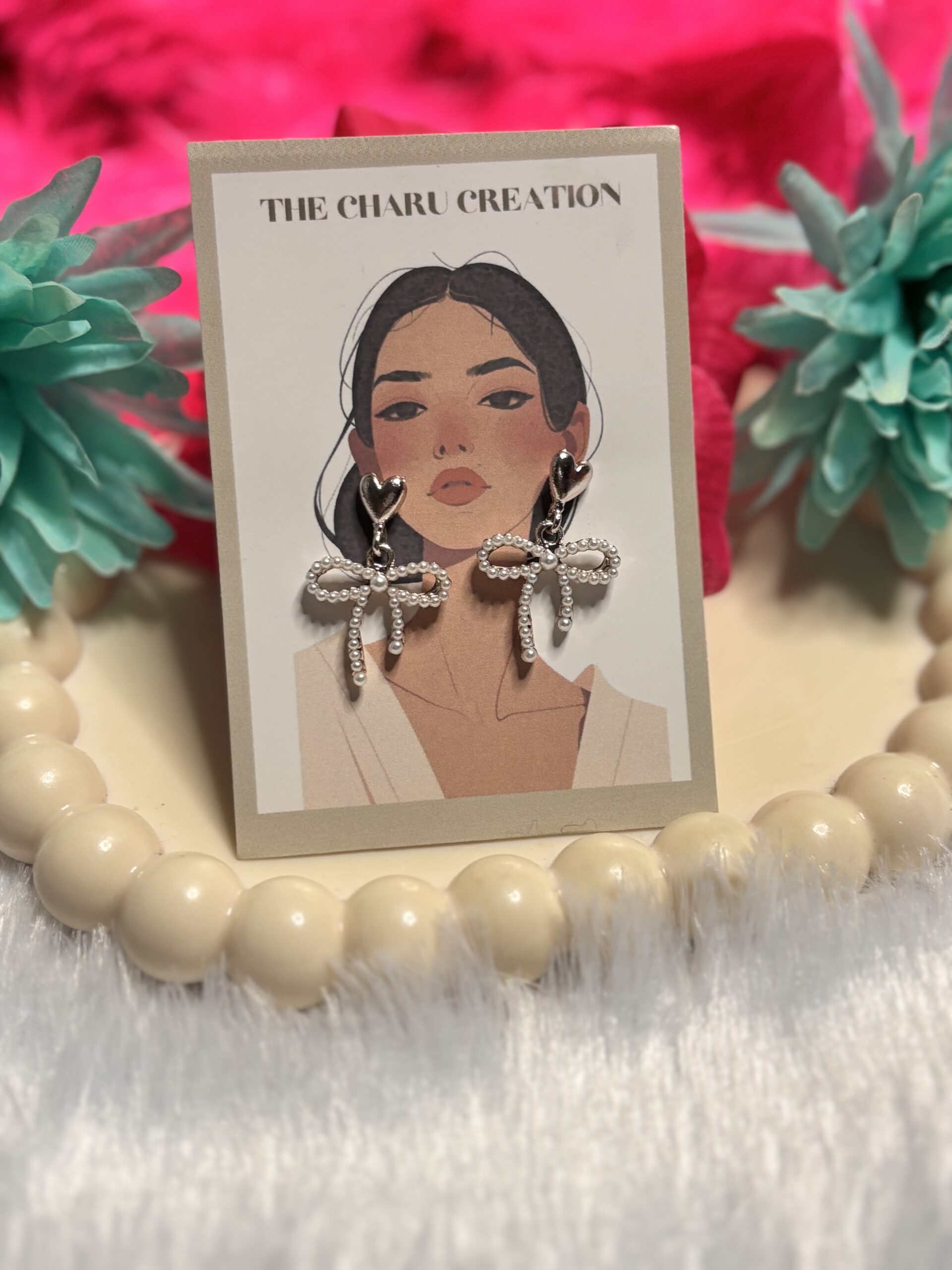 Diamond-Style Bow Drop Earrings with Heart Stud - Image 2