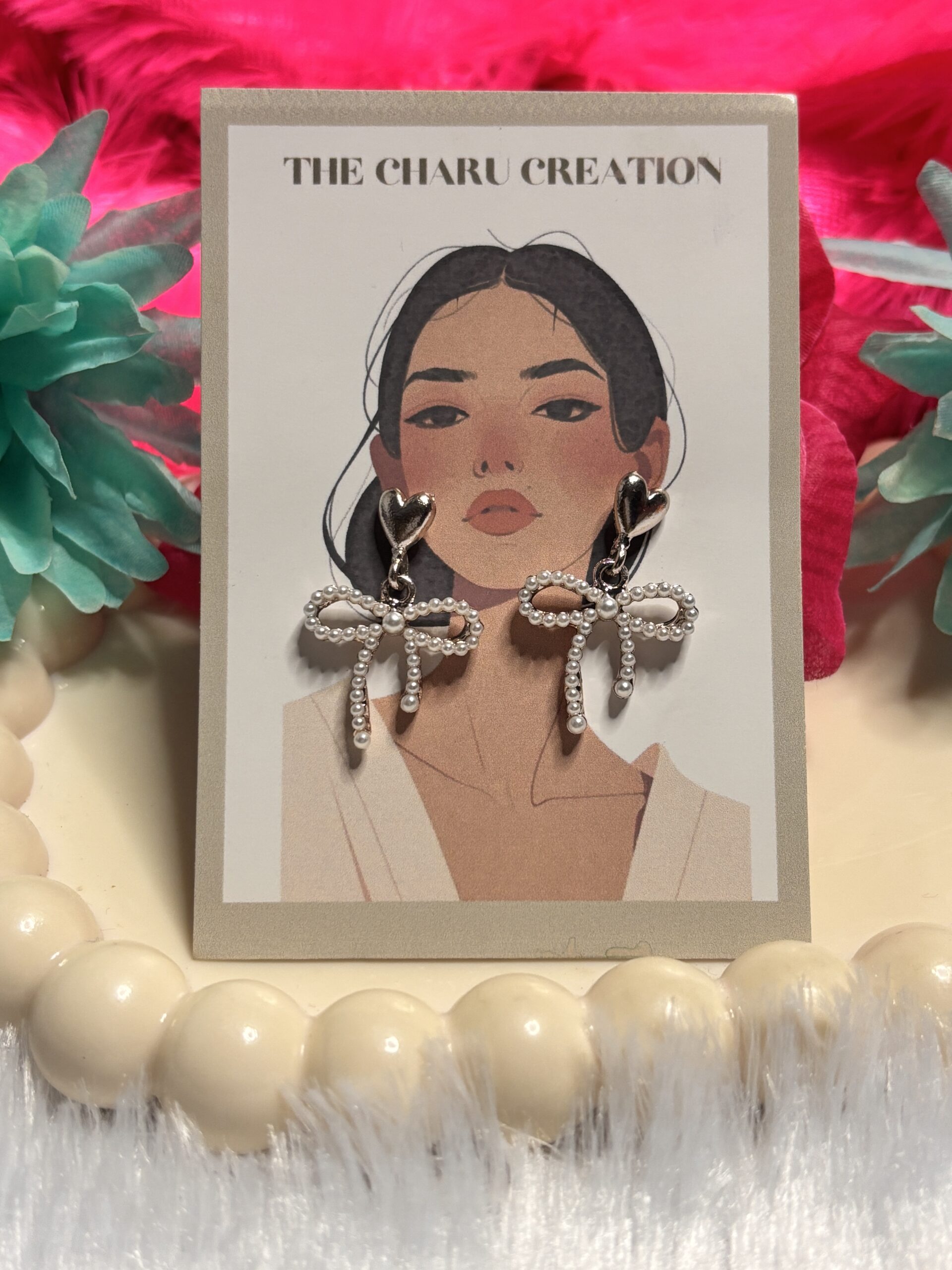 Diamond-Style Bow Drop Earrings with Heart Stud - Image 3